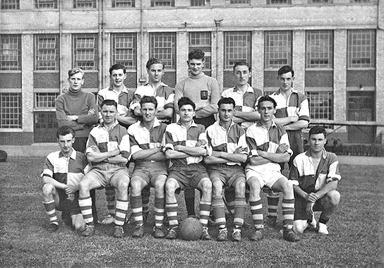 Football team with building behind